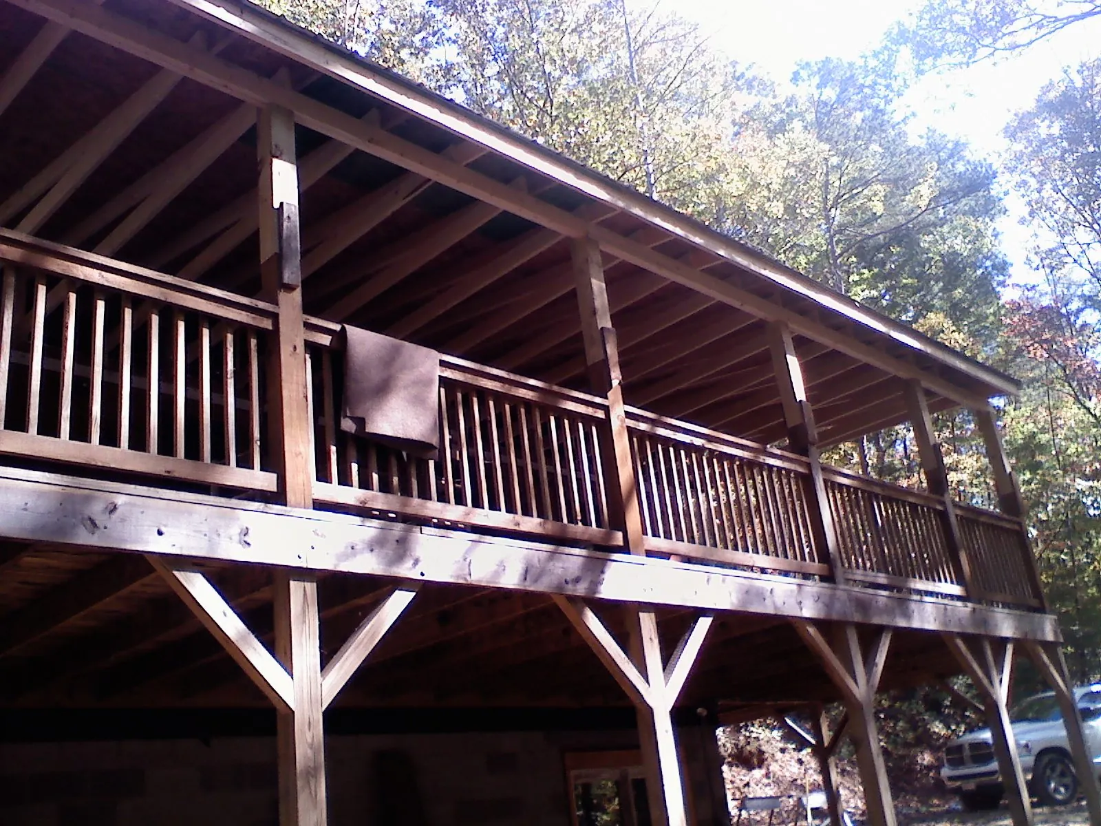 Timber framing under a new elevated porch and deck — Roof Leak Repair in Southside by Roofing Brothers
